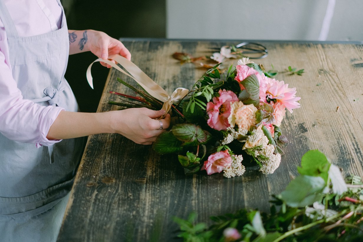 A Person Arranging Flowers