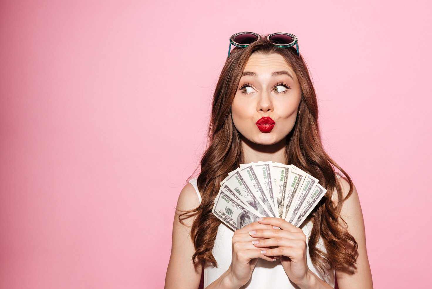 Funny Young Brunette Lady Holding Money